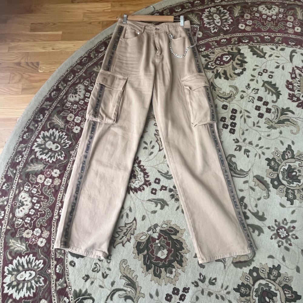 These jeans are FUBU, size small, a tan color.
